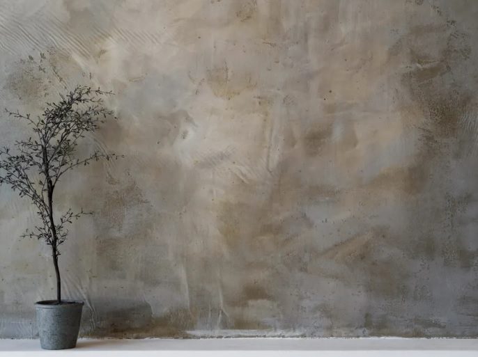 Aplicación profesional de microcemento en vivienda por Pintoref Decat